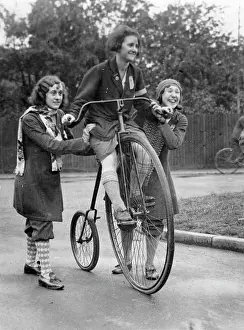 Ditton: Women on penny farthing