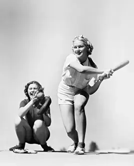 Mitt: Two women playing baseball