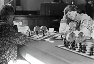 Chessboard: Women playing chess in a tournament