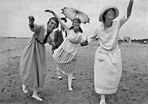 Daft: Three women posing on a beach