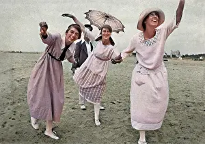 Daft: Three women posing on a beach