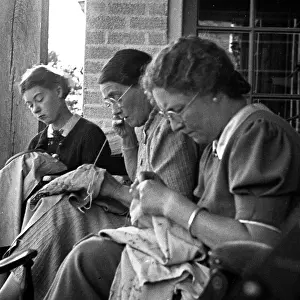 The John Turner Photographic Collection: Three women sewing