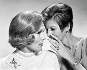 Nous: Two Women Sharing Secret and Gossip