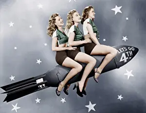 Conformity: Three women sitting on a rocket