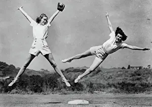 Softball: Two women in the softball game. 1938