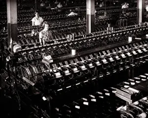 Spindles: Two Women Textile Workers Looking at Camera at
