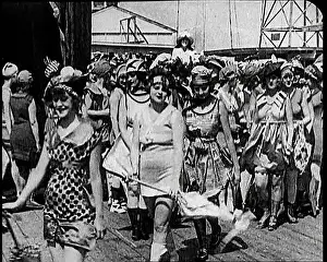 Beachfront: Women Walking By In Bathing Suits on a Beachfront