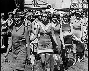 Beachfront: Women Walking By In Bathing Suits on a Beachfront