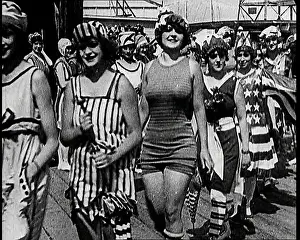 Beachfront: Women Walking By In Bathing Suits on a Beachfront