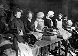 Fabrics: Women in the war auxiliary service when sorting fabrics, 191