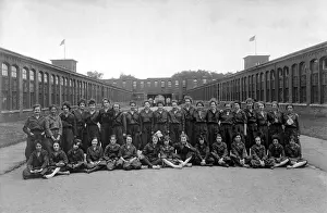 Webbing: Women war workers in their bloomer work uniforms