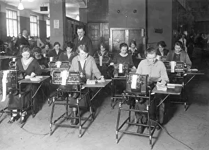 Typists: Women work in the Berlin Post Office with calculators, 1928