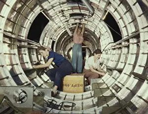 Lcgr1312: Women workers install fixtures and assemblies