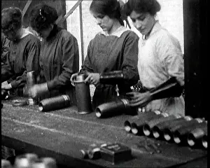 Women Working In Ammunition Factory Assembling Shells