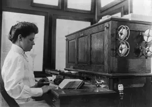 Computation: Women working with punch cards at an early ?