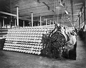 Beaming: Women working at textile machines, beaming ?