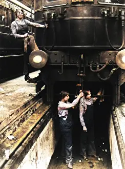 Wipe: Three women working on a train carriage