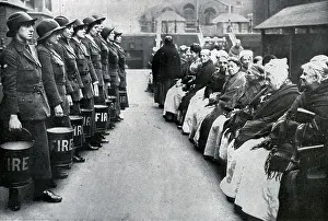 Unnamed: Women's Volunteer Reserve - Fire-fighting Drill at a London