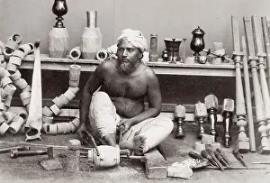 Lathe: Wood turner working with a lathe, India