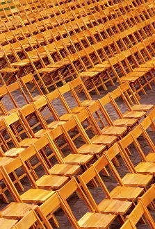 Unoccupied: Empty Wooden Folding Chairs Arranged