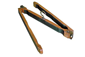 Folds: Wooden folding trouser hanger - extended