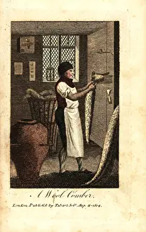 Comber: Wool comber using heated wool combs to pull