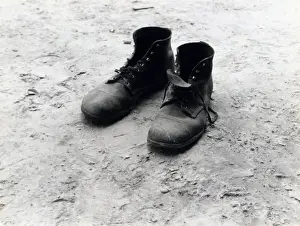 Sharecropper: The work boots of Foyd Burroughs, cotton ?