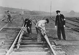 Schlickum: Worker doing track work in France, 1940