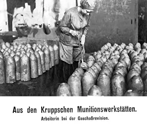 Krupp: Worker inspecting bullets, 1916