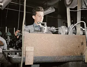 Bantam: Worker operating at a turret lathe at the