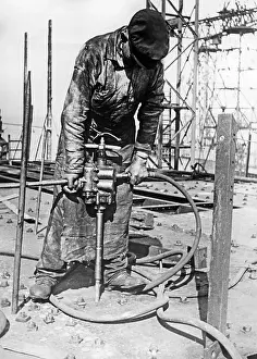 Percussion: Worker with percussion drill, 1934