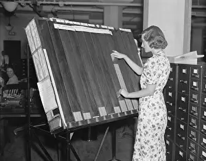 Computation: A worker in the Social Security Board Records
