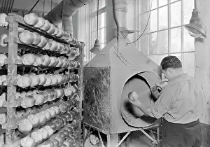 Spraying: Worker spraying face, hands and arms on rubber