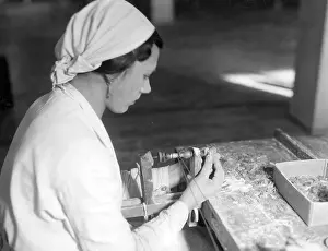 Koenigsberg: Worker at a workbench in a Bernstein factory, 1937