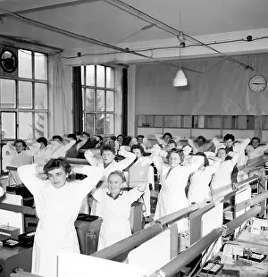 Tesla: Workers exercise - stretching - Tesla factory