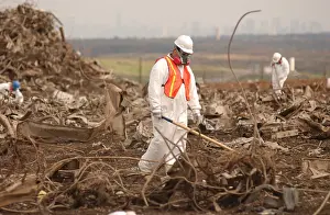 Forensics: Workers at the Fresh Kills Landfill gather ?