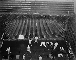 Reactors: Workers laying up the graphite core of the ?
