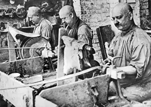 Shabby: Three workers on machines, approx. 1930