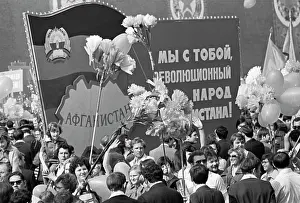 File: Workers take part in May Day demonstration in