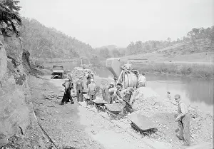 Tennessee: Workers pouring the first batch of concrete