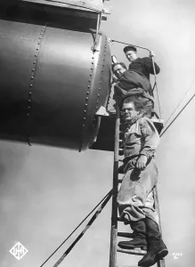Caissons: Workers in front of a pressure chamber, 1939