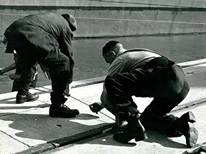Quayside: Workers on a quayside