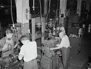 Bantam: Workers using lathes in the tool room of the