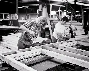 Prefab: Two Workers Women on Prefab Factory Floor Assembling a