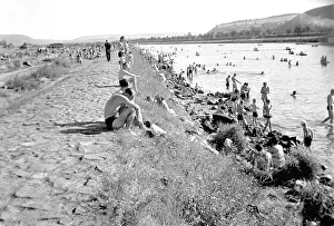 Sunbathe: Working citizens retreat to the country