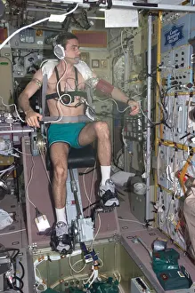 Weightless: Working out in space. Cosmonaut Yuri Malenchenko ?