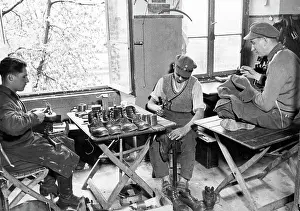 Freiwilliger: Working volunteers during sewing and shoemaking, around the