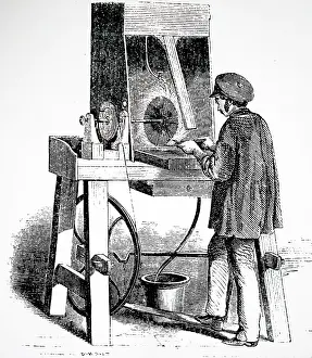 Workman: Workman buffing an electroplated object using