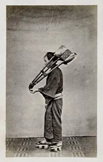 Renjo: Workman carrying implements, tools, Japan