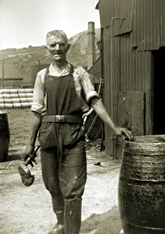 Ladle: Workman in overalls with barrel